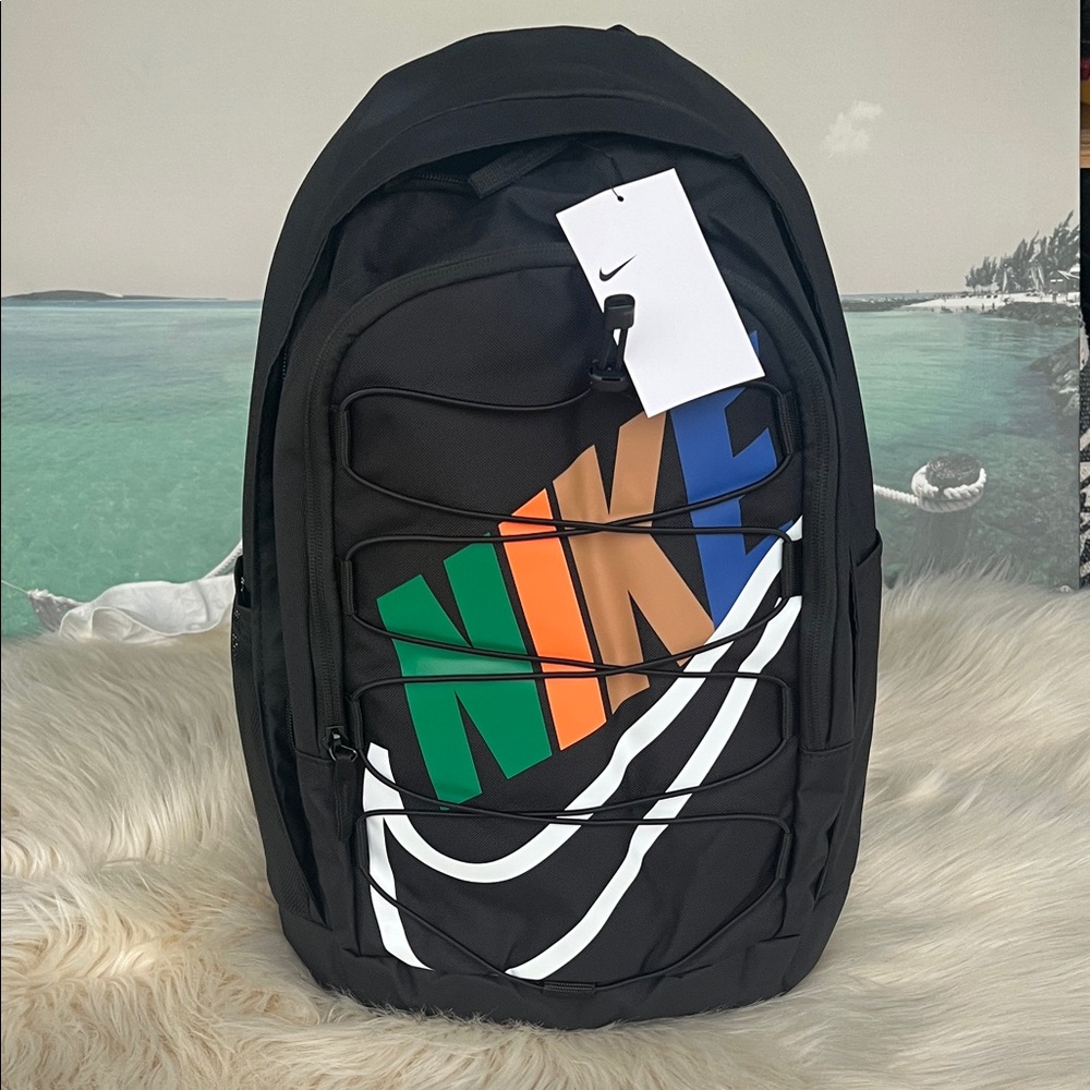 Nike Black Backpack with Green, Orange, and Blue Accents